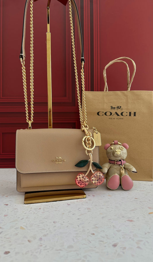 Mini Klare Crossbody Bag In Signature Canvas